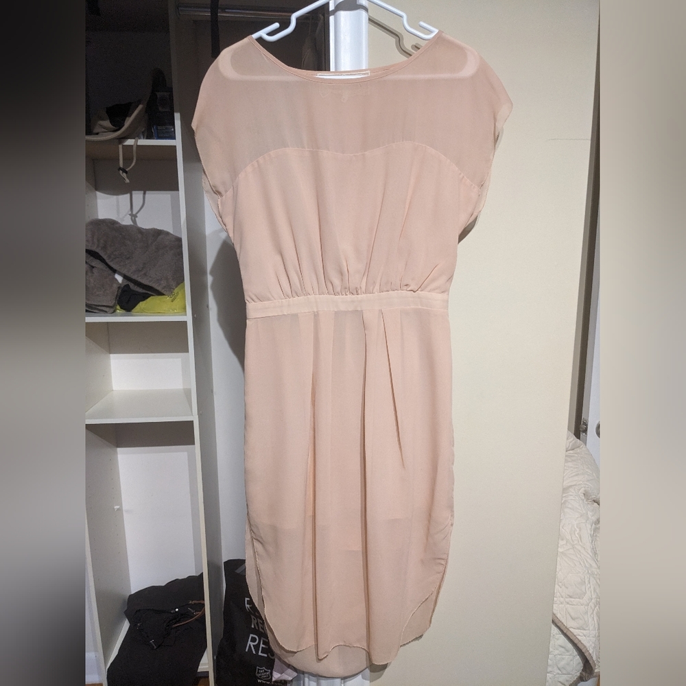 Pale pink dress.